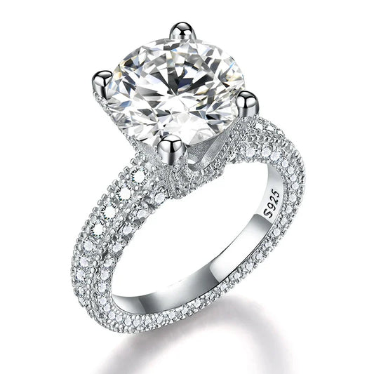 💍 Luxury 5ct Moissanite Round Cut S925 Silver 18K White Gold Plated Engagement Ring by Glam Sleek – A stunning sparkling engagement ring featuring a brilliant 5-carat round cut moissanite stone set in premium S925 sterling silver with 18K white gold plating. Designed for elegance, durability, and timeless beauty, this luxury moissanite ring is perfect for proposals, weddings, and anniversaries. A flawless choice for those seeking an affordable diamond alternative with maximum brilliance.