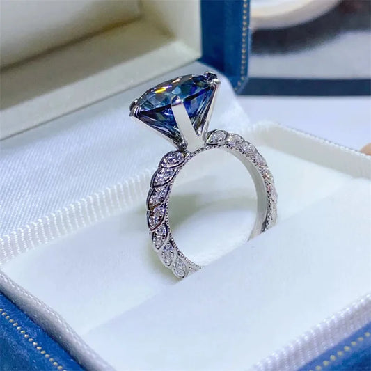 💍 5ct Grey White Moissanite Engagement Ring by Glam Sleek – A stunning blend of luxury and brilliance, crafted with a sparkling 5-carat moissanite center stone that rivals diamonds in fire and clarity. Featuring a unique grey-white moissanite hue, this elegant ring is set in a premium finish, making it the perfect choice for a modern engagement ring, promise ring, or anniversary gift. Designed for timeless beauty and durability, it captures sophistication and romance in every detail. Shop Glam Sleek’s mois