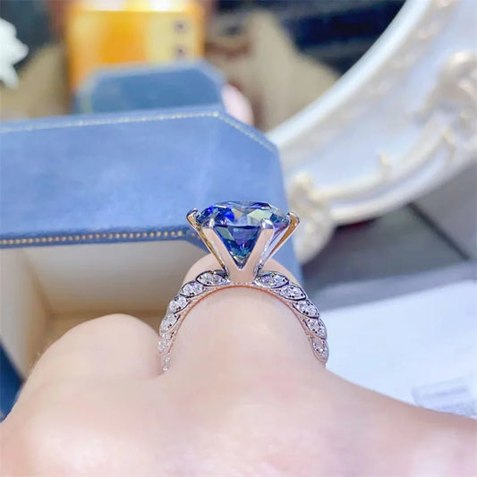 💍 5ct Grey White Moissanite Engagement Ring by Glam Sleek – A stunning blend of luxury and brilliance, crafted with a sparkling 5-carat moissanite center stone that rivals diamonds in fire and clarity. Featuring a unique grey-white moissanite hue, this elegant ring is set in a premium finish, making it the perfect choice for a modern engagement ring, promise ring, or anniversary gift. Designed for timeless beauty and durability, it captures sophistication and romance in every detail. Shop Glam Sleek’s mois