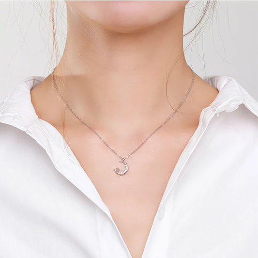 Shine bright with the Fashionable 925 Sterling Silver Moonlight Little Star Pendant for Women by Glam Sleek. Crafted in genuine 925 sterling silver, this elegant star and moon pendant necklace adds a touch of sparkle to everyday outfits and special occasions. Perfect as a gift for her, it blends minimalist style with timeless charm, making it a must-have in every jewelry collection.