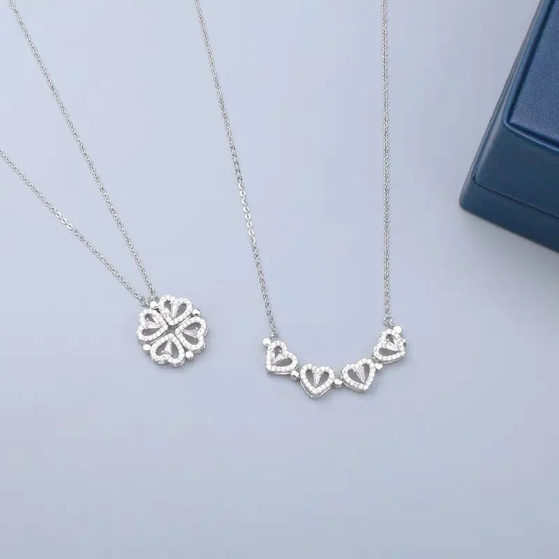 Add a touch of elegance and charm with the *Sparkling Four Hearts Clover Necklace* by Glam Sleek. This exquisite necklace features a four-heart clover design adorned with dazzling crystals, symbolizing luck, love, and elegance in every facet. Its delicate, modern chain complements any outfit, making it perfect for both everyday wear and special occasions. Embrace sophistication with a hint of sparkle that shines as beautifully as you do.