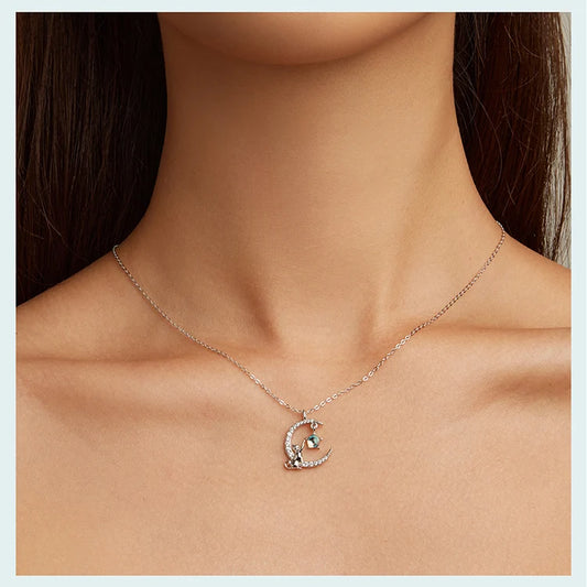 Shine with elegance in the 925 Sterling Silver Cute Cat Star Zircon Moon Necklace for Women by Glam Sleek. Crafted with premium sterling silver, this delicate pendant necklace features a charming cat, star, and moon design accented with sparkling zircon, symbolizing love and dreams. Perfect for daily wear, gifts, or special occasions, this trendy silver necklace blends cute charm with timeless elegance. Ideal for women who love cat jewelry, moon necklaces, and celestial-inspired fashion.