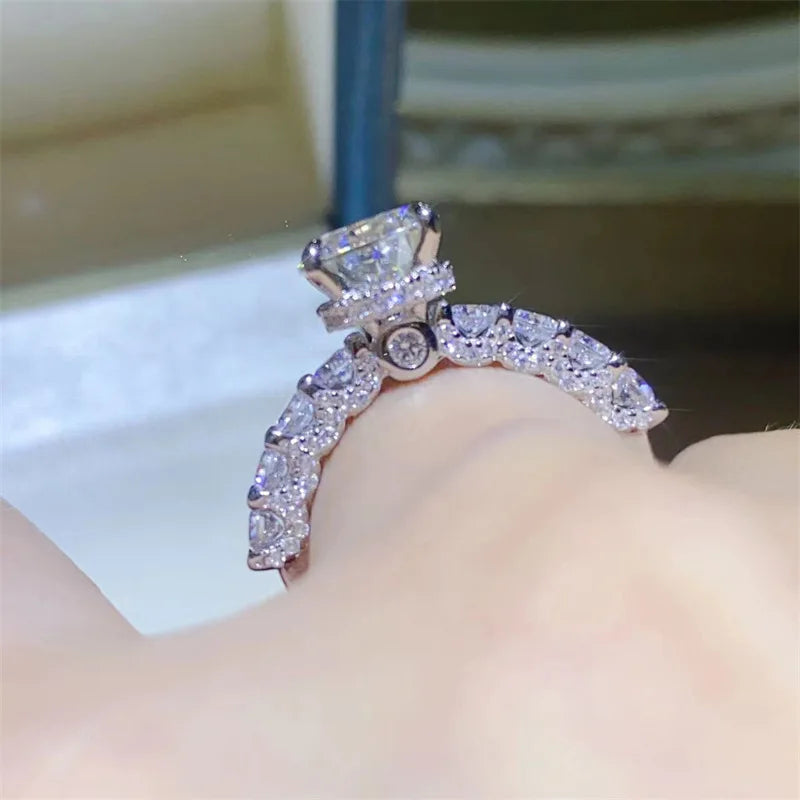 Introducing the **Glam Sleek Sparkling Moissanite Promise Ring**—a timeless symbol of love and commitment. Crafted with a brilliant moissanite gemstone, it dazzles with unmatched sparkle, resembling the beauty of a diamond at a fraction of the cost. Set in sleek, polished metal, this ring combines elegance and sophistication, perfect for celebrating your most cherished promises.