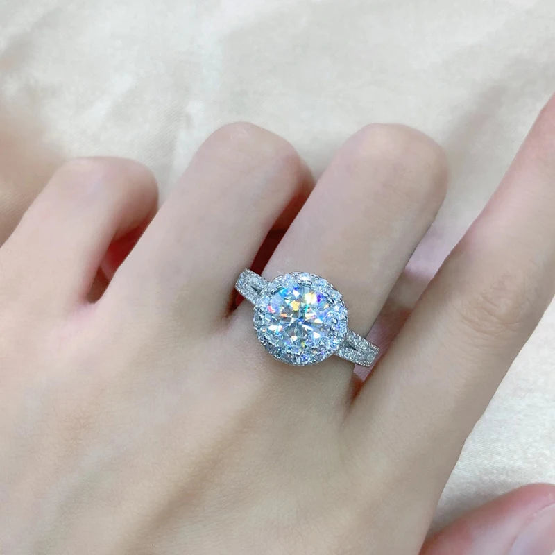 Introducing the *Glam Sleek Sparkling Round Cut 2ct Moissanite Ring*, a stunning symbol of timeless elegance. Featuring a brilliant 2-carat round-cut moissanite, this ring dazzles with unmatched sparkle, making it the perfect choice for engagement, wedding, or anniversary. Crafted with meticulous attention to detail, it offers both luxury and durability. Celebrate your love with a ring that shines as bright as your forever.