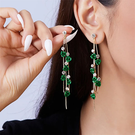 🌿✨ Add elegance to your look with Glam Sleek’s New Green Rose Flower Long Tassel Dangle Earrings. Featuring a chic floral design with flowing tassels, these statement earrings blend romantic charm and modern fashion. Perfect for parties, weddings, or everyday glam, they’re lightweight, trendy, and crafted for effortless style.