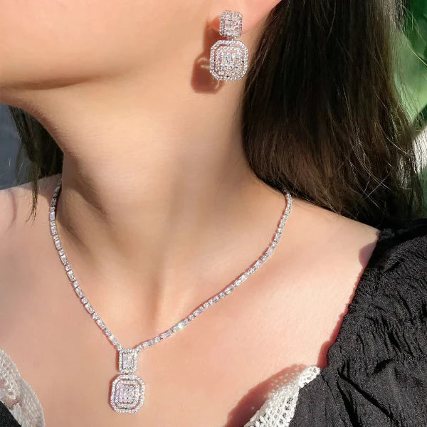 Luxury Water Shiny Baguette Cubic Zirconia Wedding Bridal Party Necklace Set for Women by Glam Sleek features dazzling baguette-cut cubic zirconia stones designed to create an elegant, luxurious sparkle. Perfect for weddings, bridal parties, engagements, parties, and special occasions, this statement jewelry set adds sophisticated glamour to any outfit.