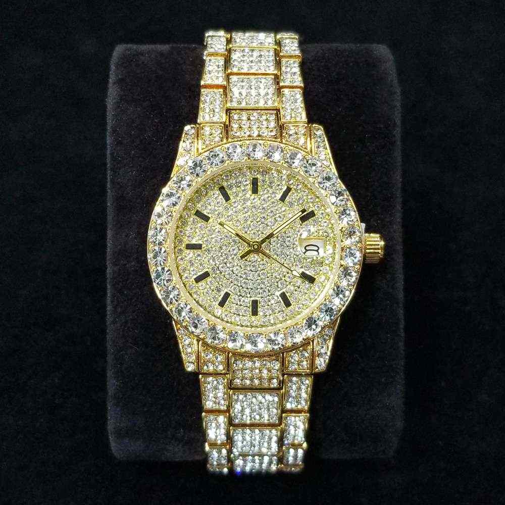 Shop Glam Sleek's iced out watch for women featuring a shiny stainless steel case, quartz movement and sparkling crystal details. Perfect for elegant everyday style.