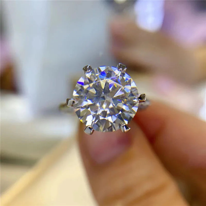 💍 5ct Grey White Moissanite Engagement Ring by Glam Sleek – A stunning blend of luxury and brilliance, crafted with a sparkling 5-carat moissanite center stone that rivals diamonds in fire and clarity. Featuring a unique grey-white moissanite hue, this elegant ring is set in a premium finish, making it the perfect choice for a modern engagement ring, promise ring, or anniversary gift. Designed for timeless beauty and durability, it captures sophistication and romance in every detail. Shop Glam Sleek’s mois