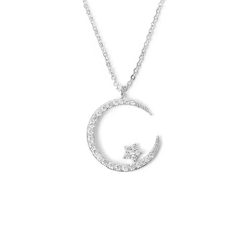 ✨ Add celestial charm to your look with the Crystal Shining Inlaid Zirconia Moon Star Pendant Necklace by Glam Sleek. Featuring a sparkling moon and star design with shimmering zirconia crystals, this dainty gold-tone necklace is perfect for everyday wear or special occasions. Lightweight, elegant, and versatile, it makes an ideal gift for women who love trendy, minimalist jewelry. Shop Glam Sleek for affordable fashion necklaces that blend modern style with timeless elegance.