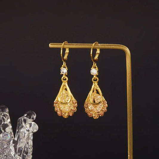 ✨ Add a touch of glamour with Glam Sleek Elegant Sparkling Coffee Water Drop Crystal Long Tassel Earrings. Designed with shimmering crystals in a chic coffee-tone water drop style, these long tassel dangle earrings bring elegance, sparkle, and sophistication to any outfit. Perfect for parties, weddings, evening wear, or special occasions, they make a stunning statement while remaining lightweight and comfortable. Elevate your jewelry collection with these fashion-forward crystal earrings loved for their lux