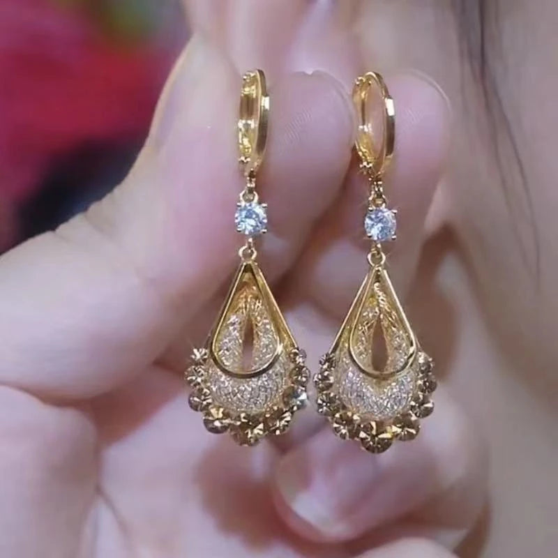 Shop shiny purple crystal tassel earrings for women featuring rhinestone water-drop details. Perfect statement jewelry for weddings, parties and special occasions.