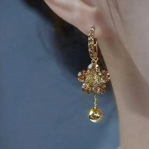 Shop elegant zircon crystal flower pendant earrings for women. Sparkling floral design, perfect for weddings, parties, special occasions and everyday style