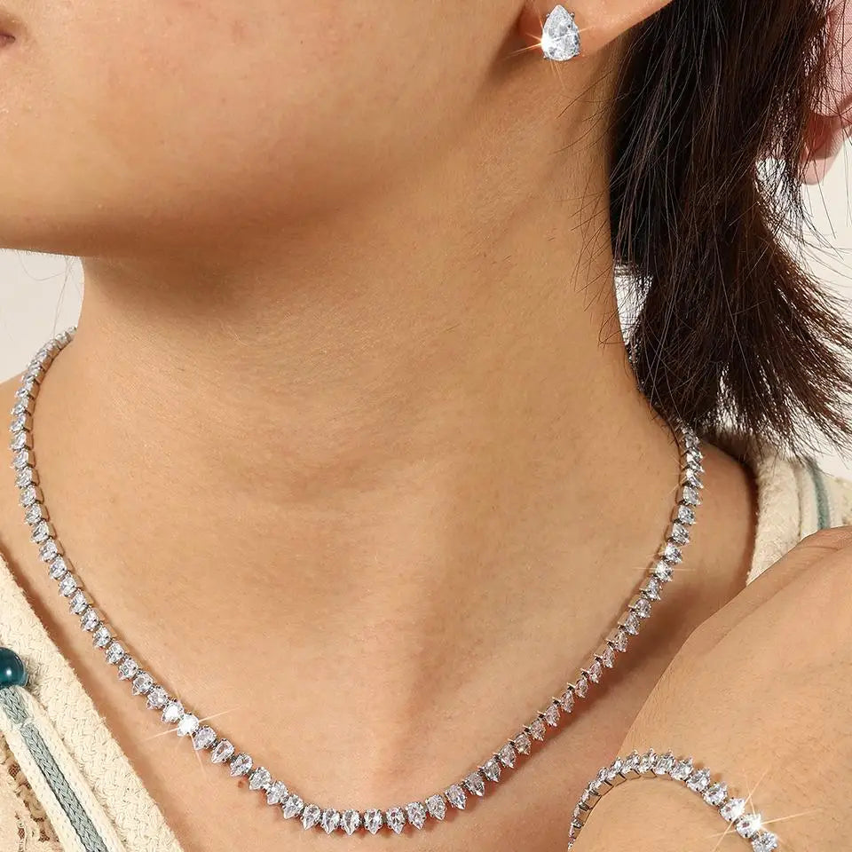 **Luxury Water Drop Zirconia Jewelry Set for Women by Glam Sleek** — Elevate your look with this elegant zirconia jewelry set featuring a graceful water-drop design and brilliant sparkle. Perfect for weddings, parties, engagements, formal occasions, and special events. A stylish choice for women seeking **elegant jewelry, zircon jewelry sets, statement jewelry, and bridal accessories**.
