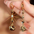 Exquisite Brown Rhinestone Ball Zircon Tassel Earrings for Women by Glam Sleek — Add effortless glamour to any look with these elegant brown rhinestone ball and zircon tassel earrings. Featuring sparkling zircon accents, a statement ball design, and flowing tassel detail, they’re perfect for weddings, parties, evenings, and special occasions. A stylish choice for women who love trendy, elegant, and statement jewelry.