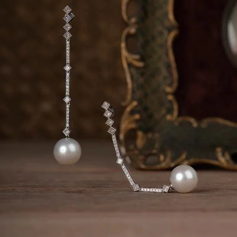 Shop elegant pearl long drop earrings for women at Glam Sleek. Perfect for weddings, parties, formal occasions, and everyday elegant style.