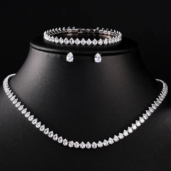 Luxury Water Drop Zirconia Jewelry Set for Women by Glam Sleek** — Elevate your look with this elegant zirconia jewelry set featuring a graceful water-drop design and brilliant sparkle. Perfect for weddings, parties, engagements, formal occasions, and special events. A stylish choice for women seeking **elegant jewelry, zircon jewelry sets, statement jewelry, and bridal accessories**.
