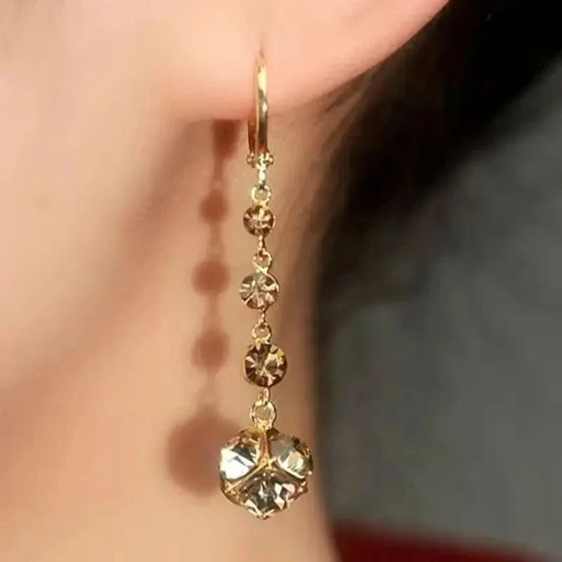 Exquisite Brown Rhinestone Ball Zircon Tassel Earrings for Women by Glam Sleek — Add effortless glamour to any look with these elegant brown rhinestone ball and zircon tassel earrings. Featuring sparkling zircon accents, a statement ball design, and flowing tassel detail, they’re perfect for weddings, parties, evenings, and special occasions. A stylish choice for women who love trendy, elegant, and statement jewelry.