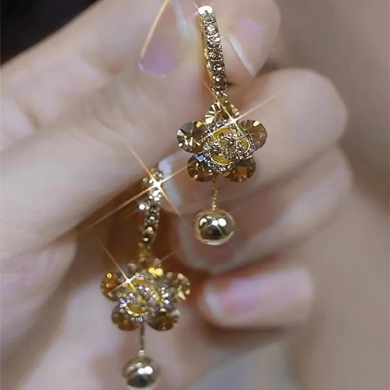 Shop elegant zircon crystal flower pendant earrings for women. Sparkling floral design, perfect for weddings, parties, special occasions and everyday style