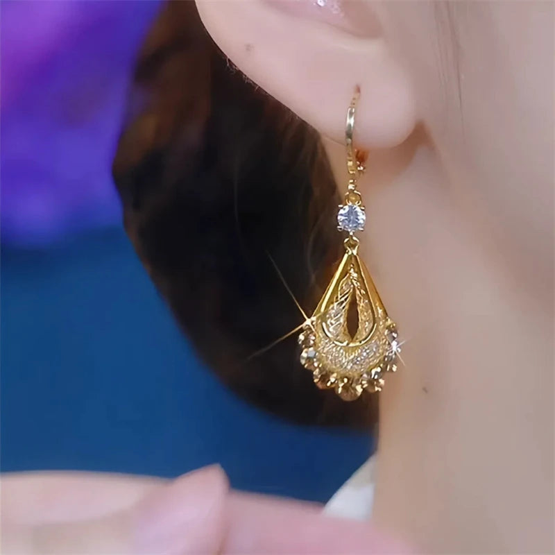 Shiny Rhinestone Brown Water Drop Crystal Long Tassel Earrings add glamorous sparkle to any look. Featuring elegant purple crystal water-drop details, rhinestones, and long tassel accents, these statement earrings for women are perfect for weddings, parties, evening events, and special occasions. A stylish choice for anyone looking for trendy, elegant, and glamorous women’s earrings.