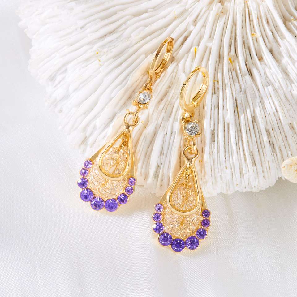 Shiny Rhinestone Purple Water Drop Crystal Long Tassel Earrings add glamorous sparkle to any look. Featuring elegant purple crystal water-drop details, rhinestones, and long tassel accents, these statement earrings for women are perfect for weddings, parties, evening events, and special occasions. A stylish choice for anyone looking for trendy, elegant, and glamorous women’s earrings.