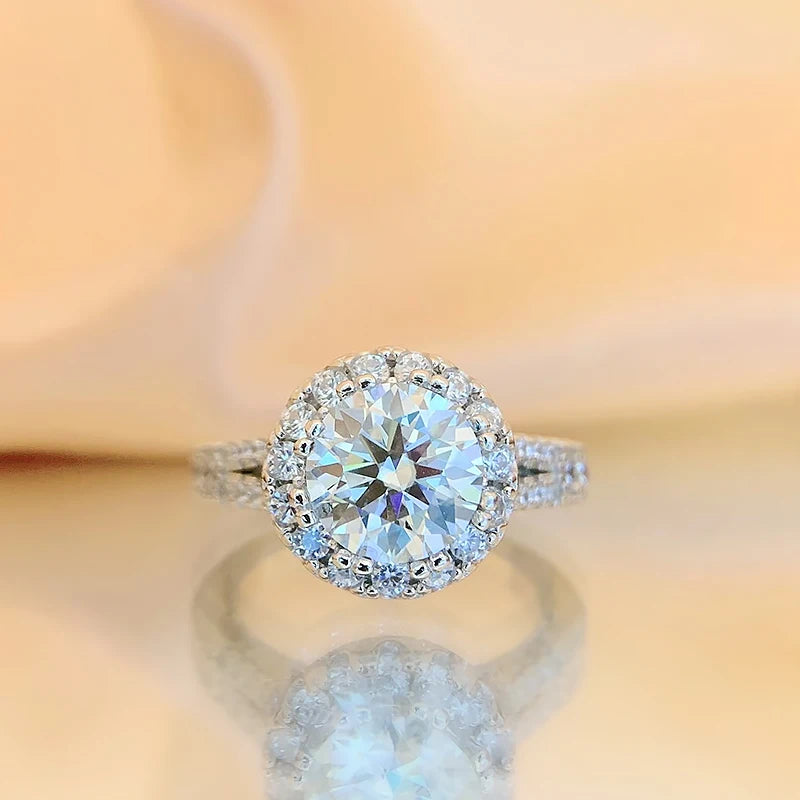 Introducing the *Glam Sleek Sparkling Round Cut 2ct Moissanite Ring*, a stunning symbol of timeless elegance. Featuring a brilliant 2-carat round-cut moissanite, this ring dazzles with unmatched sparkle, making it the perfect choice for engagement, wedding, or anniversary. Crafted with meticulous attention to detail, it offers both luxury and durability. Celebrate your love with a ring that shines as bright as your forever.