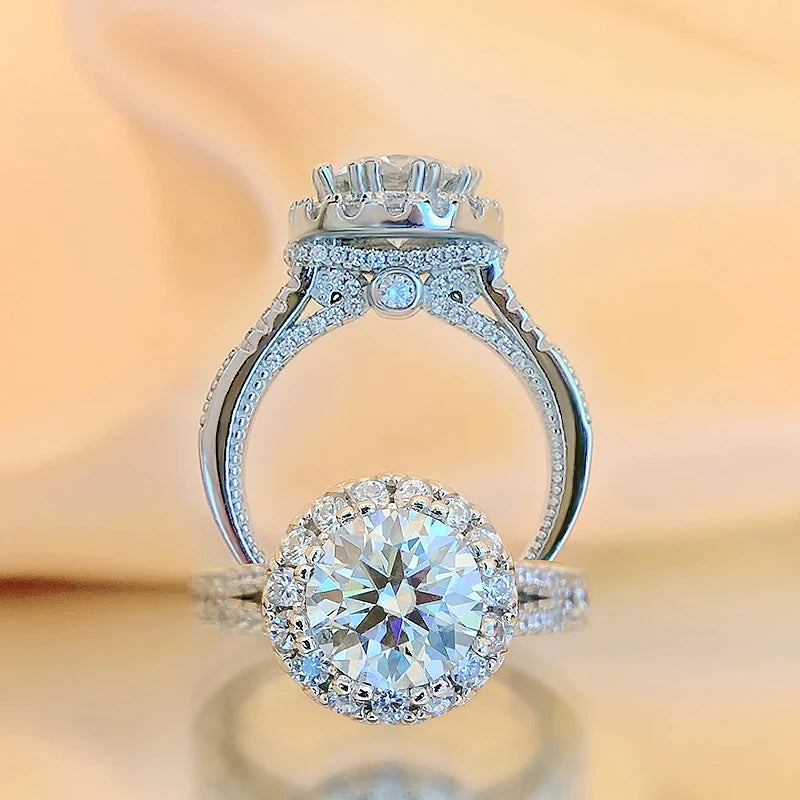 Introducing the *Glam Sleek Sparkling Round Cut 2ct Moissanite Ring*, a stunning symbol of timeless elegance. Featuring a brilliant 2-carat round-cut moissanite, this ring dazzles with unmatched sparkle, making it the perfect choice for engagement, wedding, or anniversary. Crafted with meticulous attention to detail, it offers both luxury and durability. Celebrate your love with a ring that shines as bright as your forever.