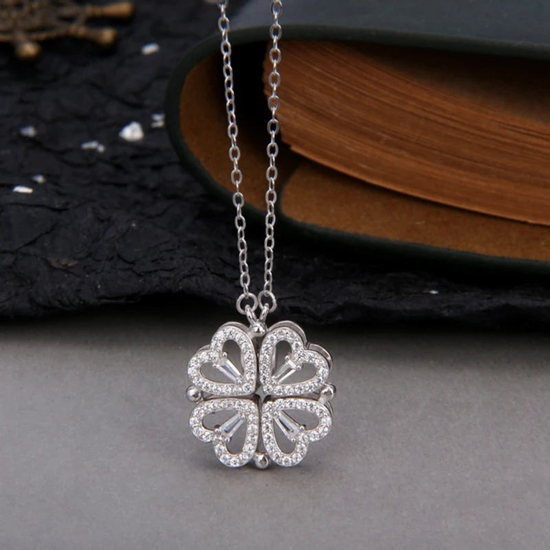 Add a touch of elegance and charm with the *Sparkling Four Hearts Clover Necklace* by Glam Sleek. This exquisite necklace features a four-heart clover design adorned with dazzling crystals, symbolizing luck, love, and elegance in every facet. Its delicate, modern chain complements any outfit, making it perfect for both everyday wear and special occasions. Embrace sophistication with a hint of sparkle that shines as beautifully as you do.
