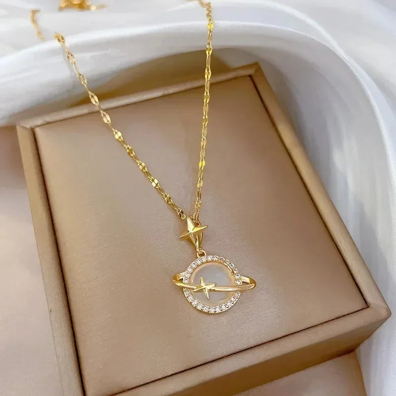 "Discover the elegance of the *New Fashion Dream Planet Crystal Pendant* by Glam Sleek. This captivating pendant features a radiant crystal encased in a delicate planet-inspired setting, adding a touch of celestial beauty to any outfit. Perfect for any occasion, this pendant symbolizes dreams and style that reach beyond the stars. Elevate your look and embrace your inner glow with this modern, timeless piece."