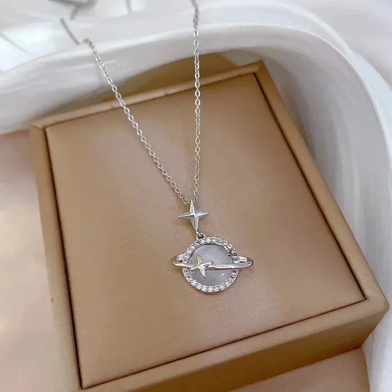 "Discover the elegance of the *New Fashion Dream Planet Crystal Pendant* by Glam Sleek. This captivating pendant features a radiant crystal encased in a delicate planet-inspired setting, adding a touch of celestial beauty to any outfit. Perfect for any occasion, this pendant symbolizes dreams and style that reach beyond the stars. Elevate your look and embrace your inner glow with this modern, timeless piece."