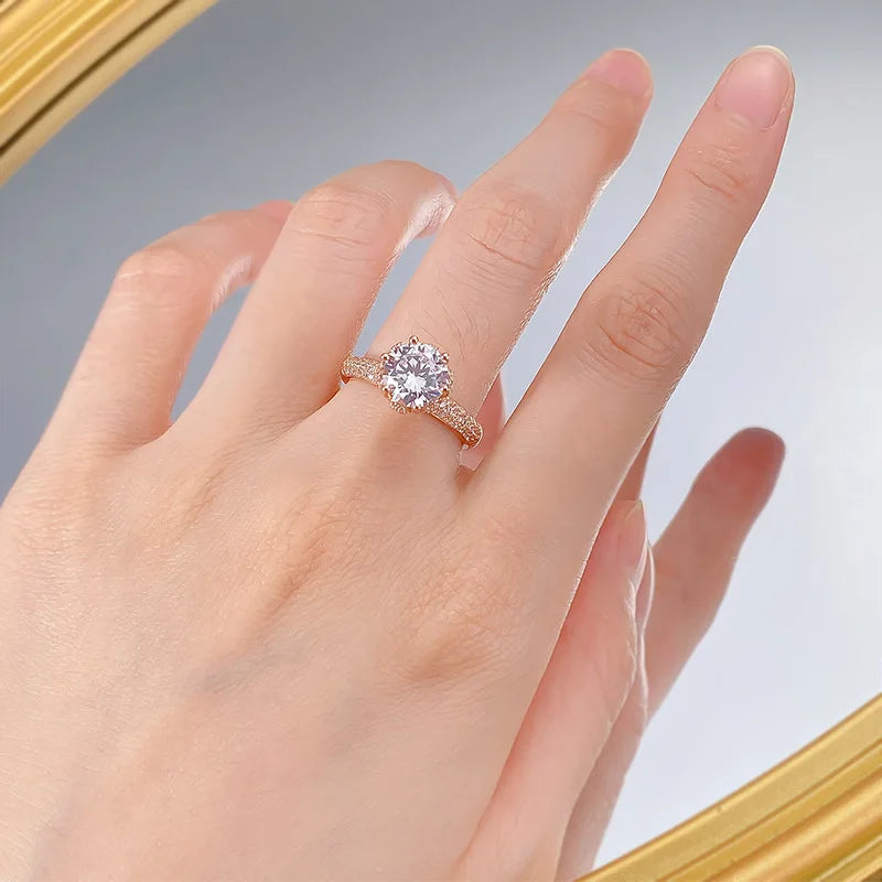 Introducing the **Sparkling Golden Flower Ring** by Glam Sleek—an elegant fusion of nature and luxury. This stunning gold-plated ring features a delicate flower design adorned with shimmering crystals, perfect for adding a touch of sparkle to any outfit. Lightweight yet durable, it offers a timeless charm that suits both casual and formal occasions. Let this dazzling accessory bloom in your jewelry collection, exuding grace and sophistication with every wear.