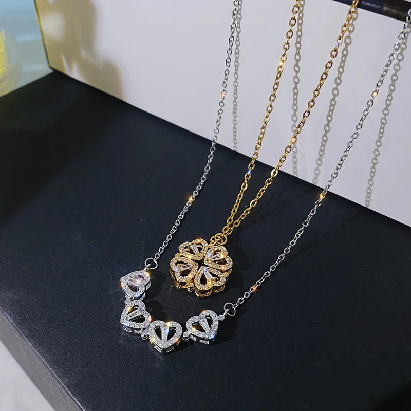 Add a touch of elegance and charm with the *Sparkling Four Hearts Clover Necklace* by Glam Sleek. This exquisite necklace features a four-heart clover design adorned with dazzling crystals, symbolizing luck, love, and elegance in every facet. Its delicate, modern chain complements any outfit, making it perfect for both everyday wear and special occasions. Embrace sophistication with a hint of sparkle that shines as beautifully as you do.