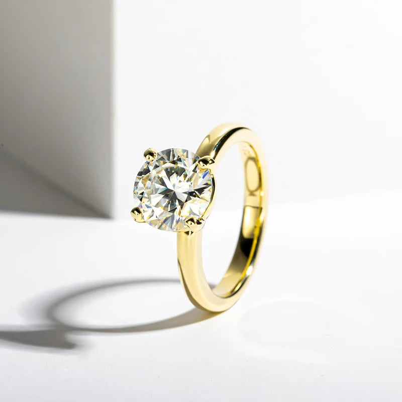 Introducing the **Sparkling Yellow Gold Ring** by *Glam Sleek* – a timeless symbol of love and commitment. Perfect for promises, engagements, weddings, or anniversaries, this ring features a sleek, polished band in radiant yellow gold, designed to dazzle with every glance. Its minimalist elegance complements any occasion, making it the ideal choice for those who cherish both style and sentiment. Celebrate your special moments with this classic and sophisticated piece that speaks of eternal devotion.
