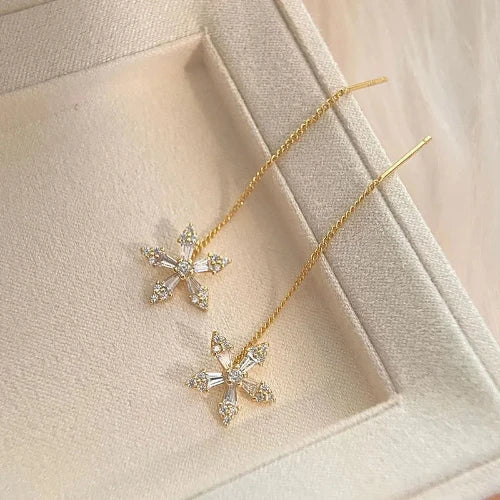 Introducing the New Needle Micro-Inlaid Zircon Flower Earrings by Glam Sleek—a perfect blend of elegance and sparkle. These dainty earrings feature meticulously crafted zircon petals, micro-inlaid for a brilliant, eye-catching shimmer. Lightweight and versatile, they add a touch of luxury to any outfit, day or night. Perfect for those who love a chic, timeless accessory.