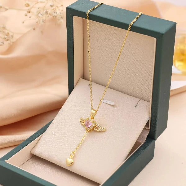 The New Cupid Angel's Wings Pendant by Glam Sleek is a delicate symbol of love and elegance. Featuring finely detailed angel wings, this pendant captures timeless grace and subtle charm, perfect for daily wear or special occasions. Crafted with high-quality materials and designed to shine with every movement, it’s a perfect gift to keep close to the heart.