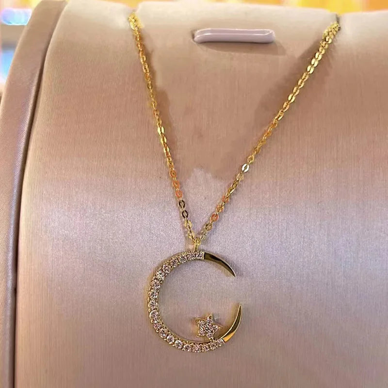 ✨ Add celestial charm to your look with the Crystal Shining Inlaid Zirconia Moon Star Pendant Necklace by Glam Sleek. Featuring a sparkling moon and star design with shimmering zirconia crystals, this dainty gold-tone necklace is perfect for everyday wear or special occasions. Lightweight, elegant, and versatile, it makes an ideal gift for women who love trendy, minimalist jewelry. Shop Glam Sleek for affordable fashion necklaces that blend modern style with timeless elegance.