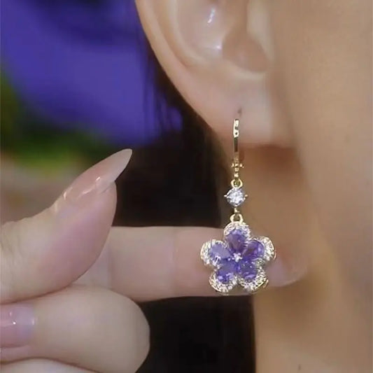 ✨ Fashionable Purple Crystal Zircon Flower Drop Earrings by Glam Sleek ✨
Add sparkle to your style with these purple crystal zircon flower drop earrings, designed for elegance and everyday glamour. Featuring a gold-tone finish with dazzling zircon stones, these lightweight statement earrings are perfect for parties, weddings, or casual wear. A must-have fashion jewelry piece for women who love timeless yet trendy accessories.