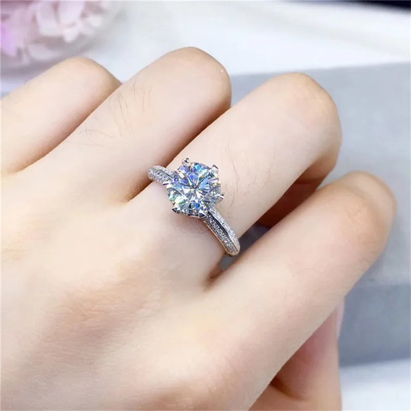 Introducing the **Sparkling Crown Moissanite Ring** by Glam Sleek – a stunning symbol of love and commitment. This elegant ring features a brilliant crown-set moissanite stone, known for its dazzling sparkle and lasting durability. Perfect for a promise, engagement, wedding, or anniversary, its timeless design ensures it shines in every moment. Crafted with precision and sophistication, this ring offers luxury without compromise, making it an unforgettable piece for any occasion.