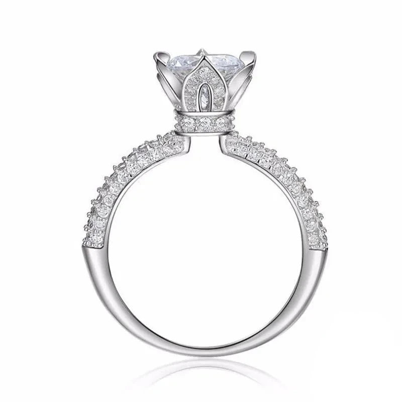 Introducing the *New Sparkling Crown* by Glam Sleek—a stunning symbol of love and commitment. Perfect for promises, engagements, anniversaries, or weddings, this ring features a dazzling crown-inspired design, meticulously crafted to capture elegance and brilliance. Its timeless sparkle embodies your most cherished moments, making it a breathtaking statement for any occasion.
