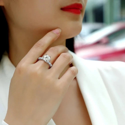 Introducing the **Glam Sleek Sparkling Round Cut Moissanite Ring**—an exquisite symbol of love and elegance. Featuring a brilliant 1-3ct real Moissanite stone, this stunning ring dazzles with unmatched fire and clarity. Perfect for promise, engagement, wedding, or anniversary, its timeless round-cut design ensures lasting beauty and sophistication. Celebrate your forever moments with the enduring brilliance of Moissanite, set in a sleek, luxurious band crafted for those who appreciate both style and sentime