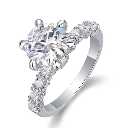 Introducing the **Glam Sleek Sparkling Round Cut Moissanite Ring**—an exquisite symbol of love and elegance. Featuring a brilliant 1-3ct real Moissanite stone, this stunning ring dazzles with unmatched fire and clarity. Perfect for promise, engagement, wedding, or anniversary, its timeless round-cut design ensures lasting beauty and sophistication. Celebrate your forever moments with the enduring brilliance of Moissanite, set in a sleek, luxurious band crafted for those who appreciate both style and sentime