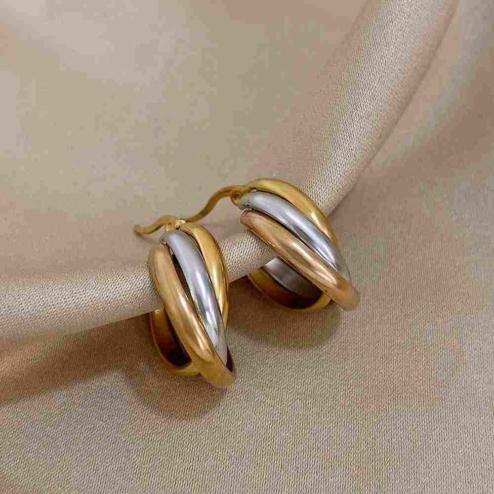 Shop trendy stainless steel U-shaped twisted hoop earrings for women at Glam Sleek. Stylish, versatile earrings perfect for everyday, party and elegant looks.
